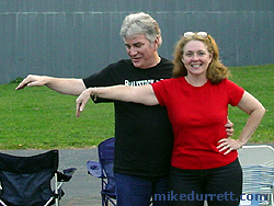 Mike and Donna Durrett perform close-up among shouts, cheers, and tossed posies. Photo copyright 2004 Mike Durrett, all rights reserved.