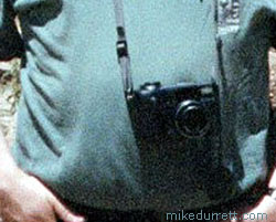 The stomach of Mike adorned by some tiny underling chimpanzee camera. Photo copyright 2003-2004 Donna Durrett, all rights reserved.