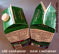 Photo: Milk containers, the old one with a twist-top spout, the new without. Copyright 2004 Mike Durrett, all rights reserved.