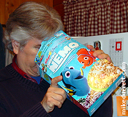 Photo: Mike inspects his box of Finding Nemo.